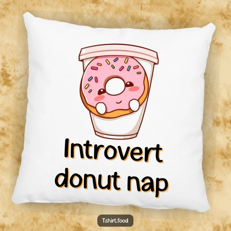 Funny shy donut pillow featuring a blushing donut with sprinkles hiding behind a coffee cup, designed for comfort and sweet humor.