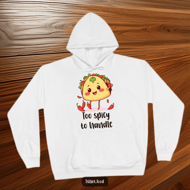 Funny juggling taco hoodie showing a smiling taco with legs juggling chili peppers, cozy and ready for a fiesta.