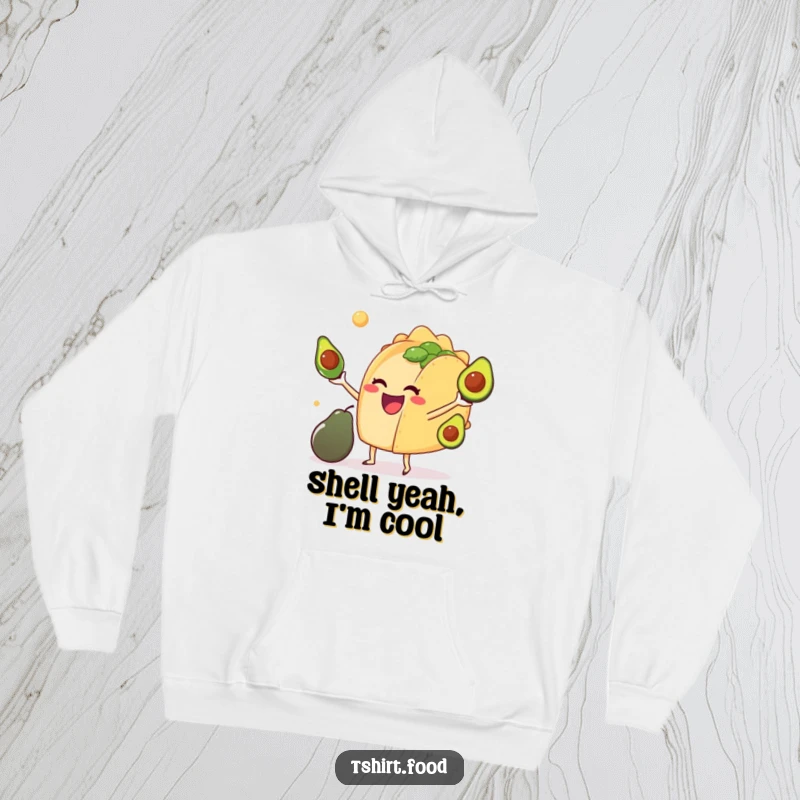 Funny hoodie showcasing a delighted anthropomorphic taco juggling tiny avocados, perfect for cozy, humorous wear and as a gift.