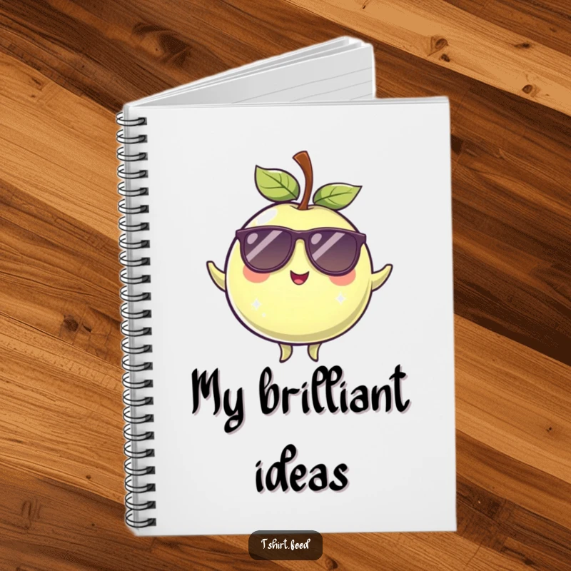 Funny winking plum with sunglasses, in a balanced pose, gracing the cover of a cool and functional notebook.