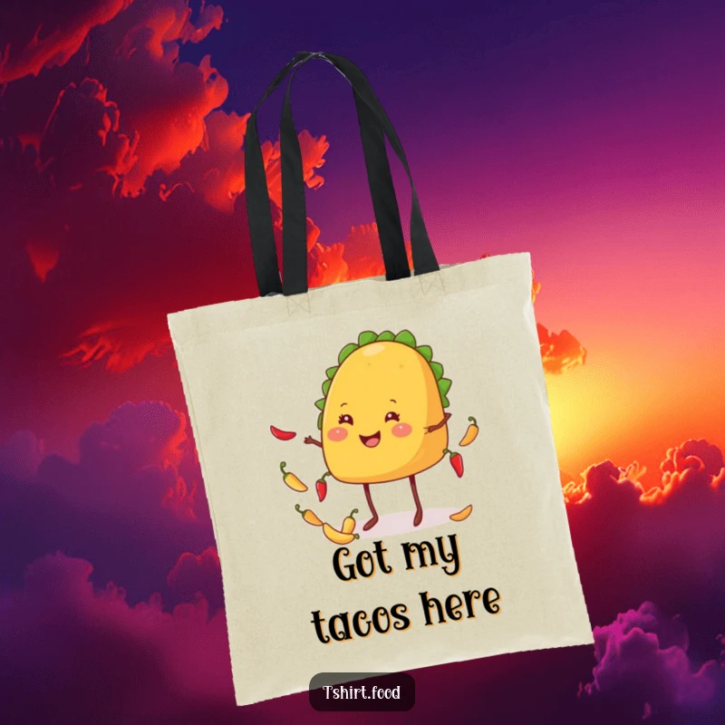 Funny taco tote bag showing a smiling taco with legs juggling colorful tiny chiles, ideal for grocery runs.